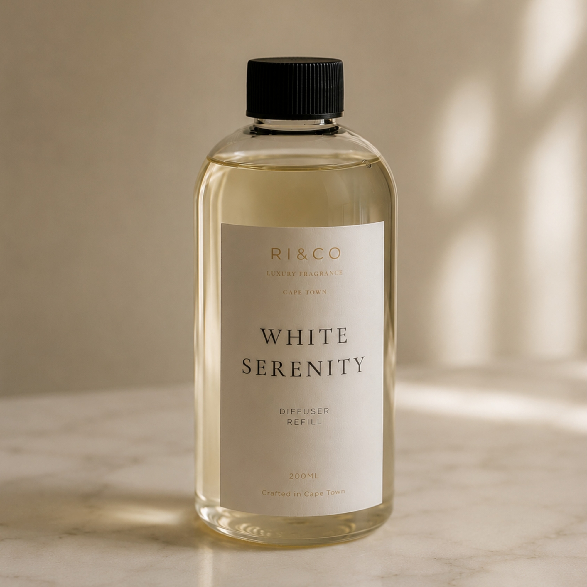 Luxury White Serenity reed diffuser refill by RI&CO with soft spa-inspired luxury styling and warm ivory tones.